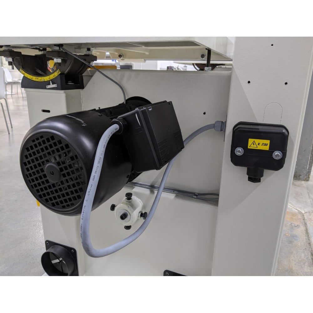 SCM Formula S 540P bandsaw motor compartment showing the drive motor and V.230 electrical connection box mounted on the rear panel