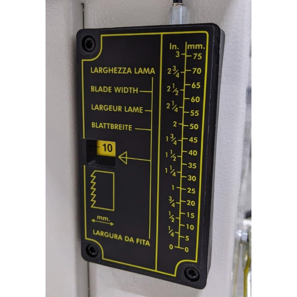 Blade tension indicator on the SCM Formula S 540P showing blade width reference scale in inches and millimeters used to set correct blade tension